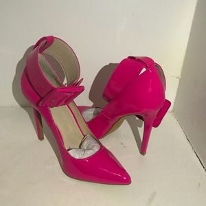 Pink patent leather pumps